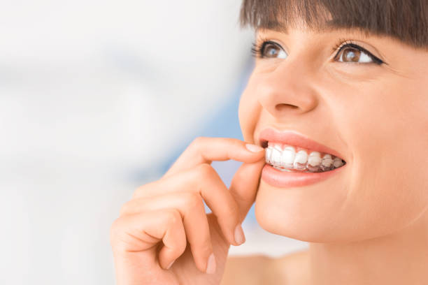 a woman wearing her Invisalign