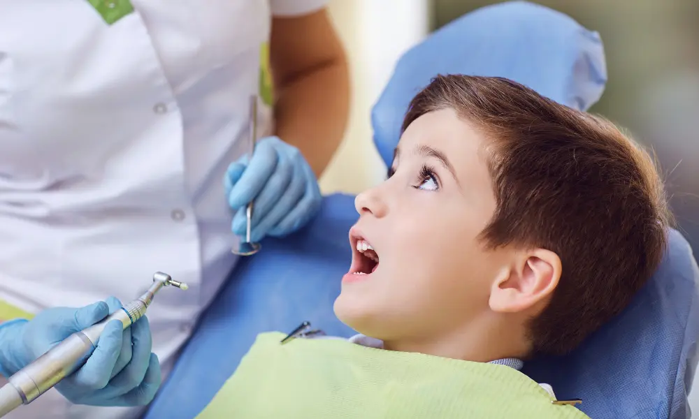 child receiving dental exam at pediatric dentist Charlotte NC